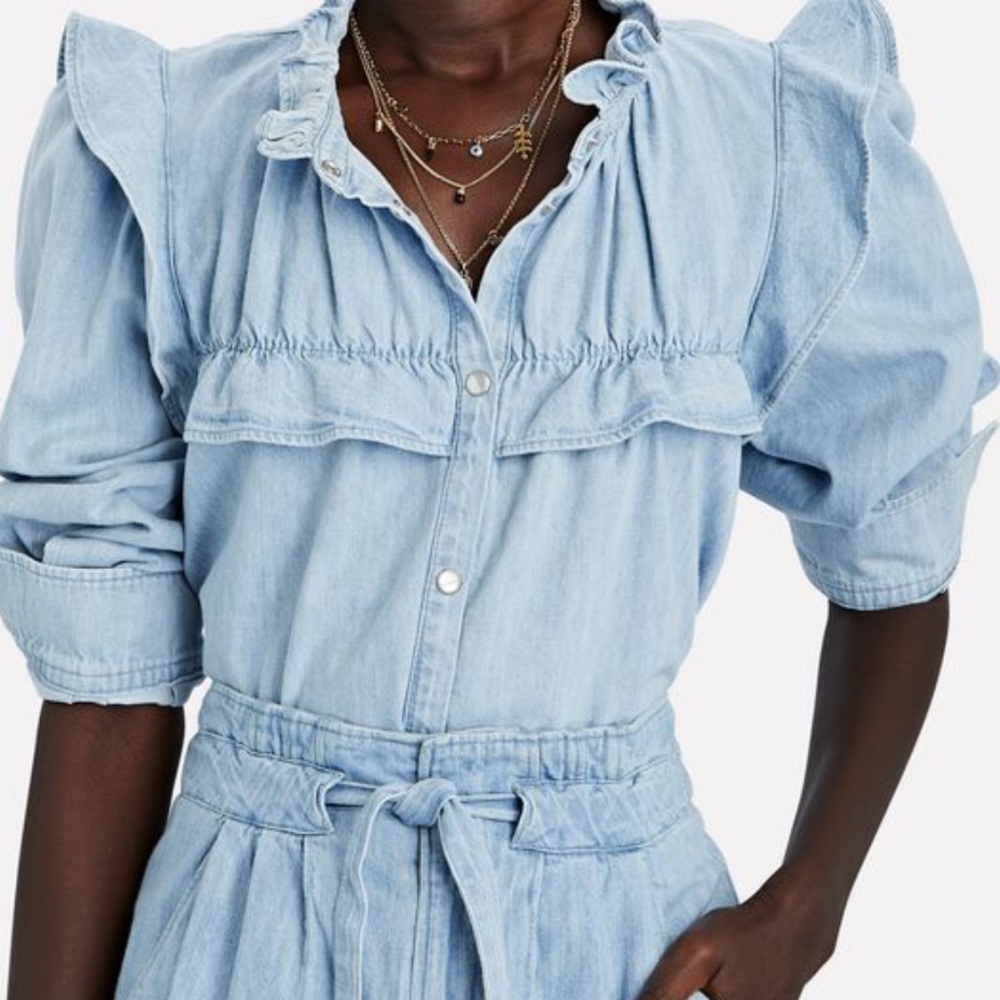 Isabel Marant Idety blouse is tailored in a chambray. Ruffled shoulders